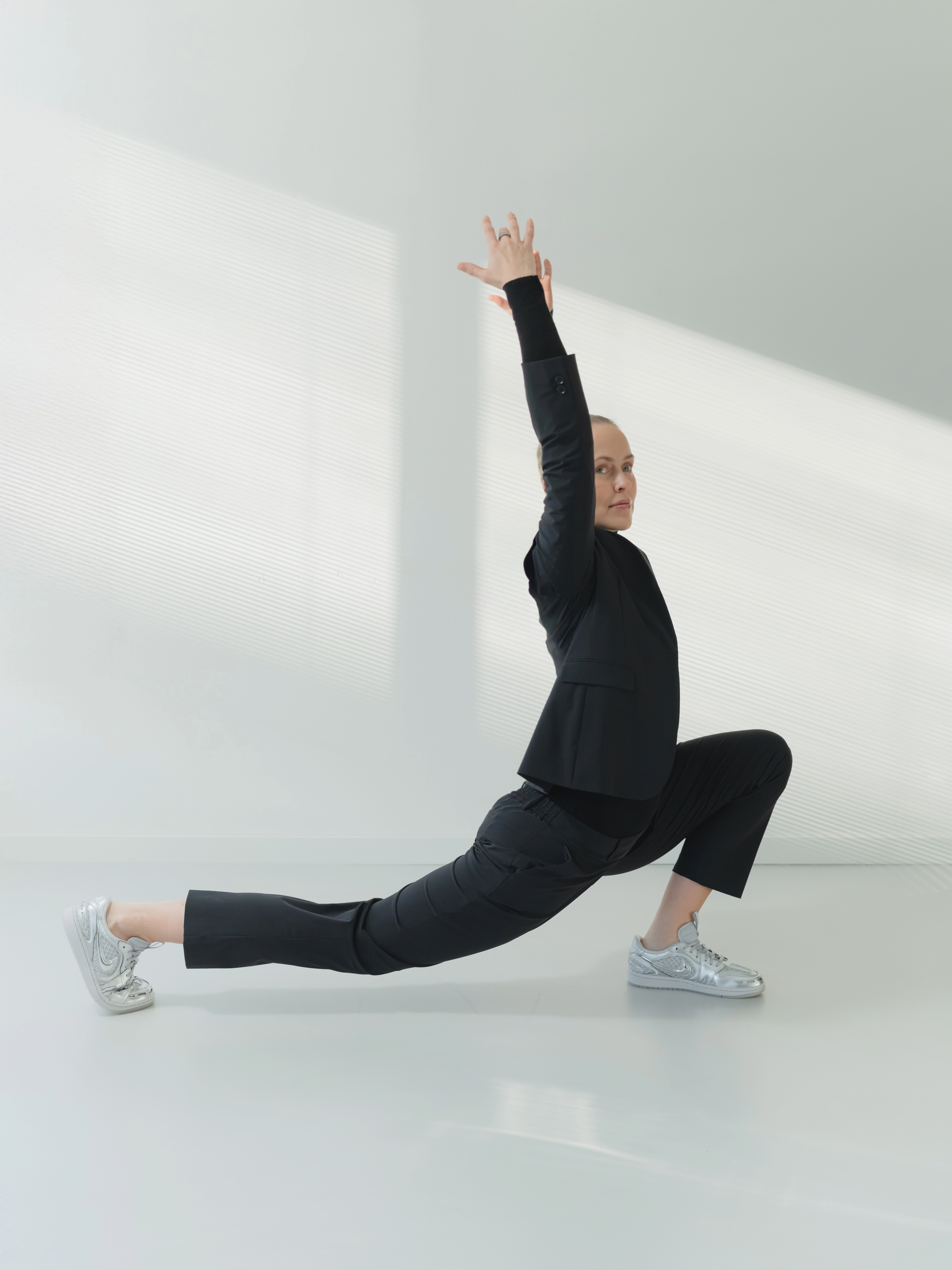 May Motion-Tech regular tapered trousers