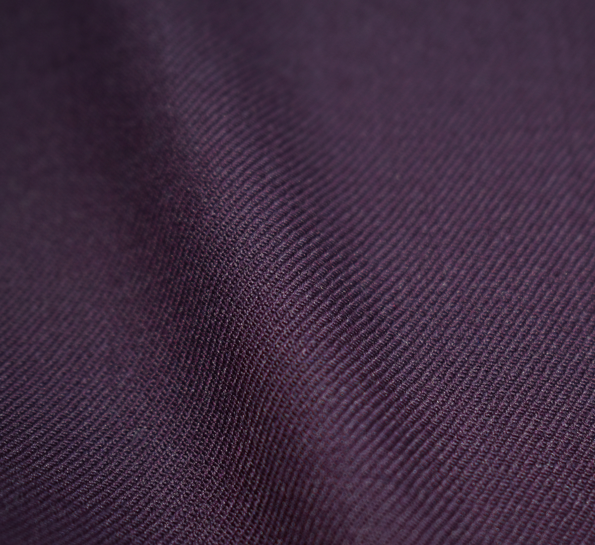 Close-up of purple wool fabric texture