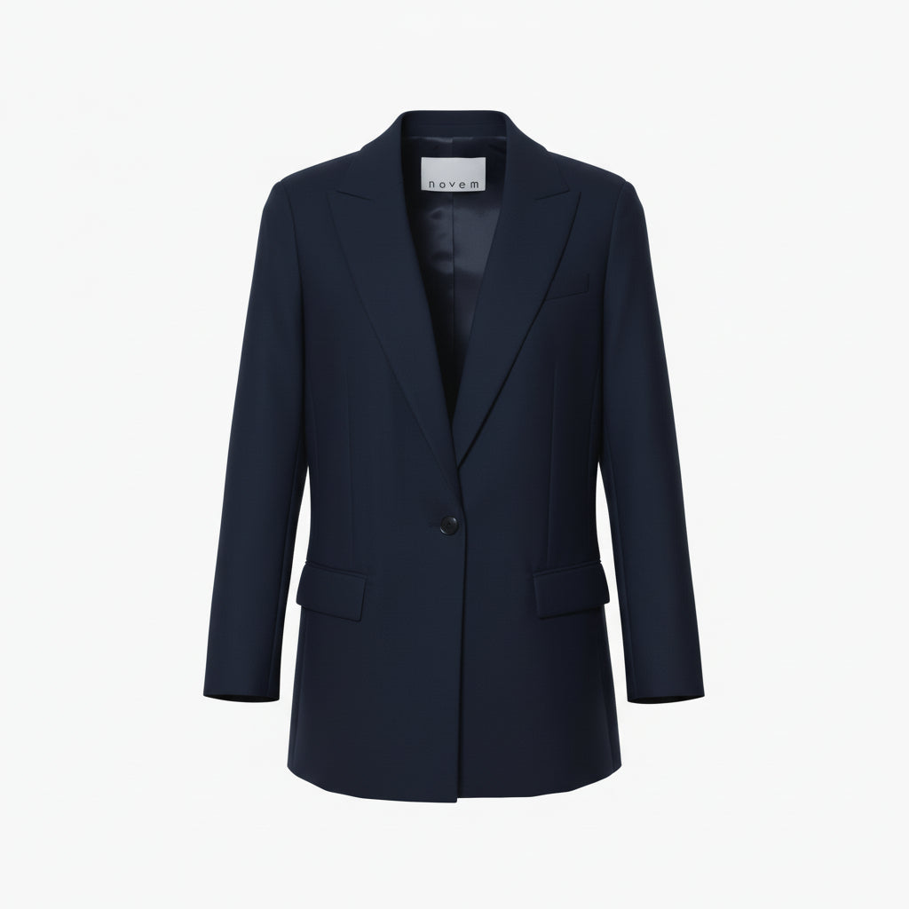 Blue single-breasted women’s peak lapel blazer in mid-weight stretch serge wool.